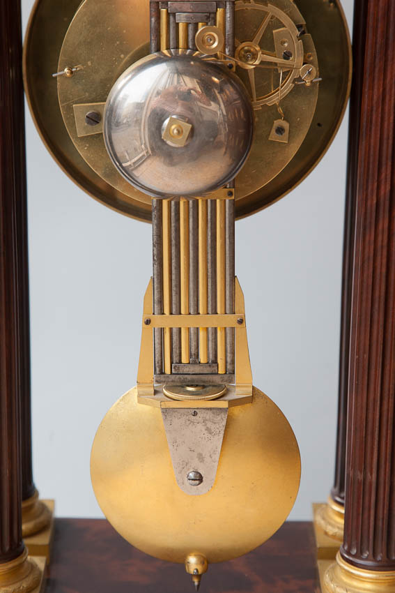 steel and gilt bronze graduated movement on early 19th century portico clock